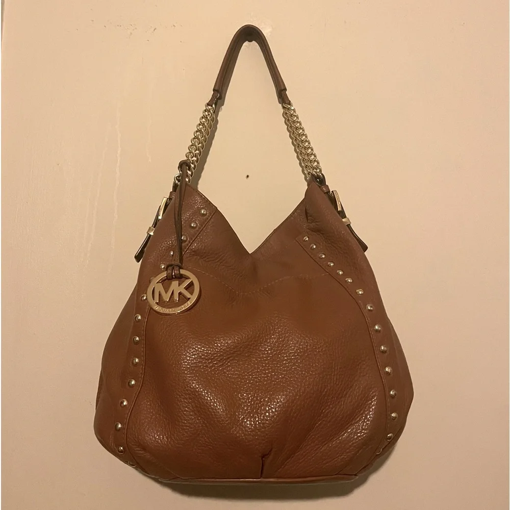 Michael Kors cognac pebbled leather hobo bag w hang tag